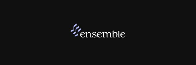 A minimalist black background displays the "ensemble" logo in white lowercase letters, accompanied by a purple stylized icon to the left of the text.