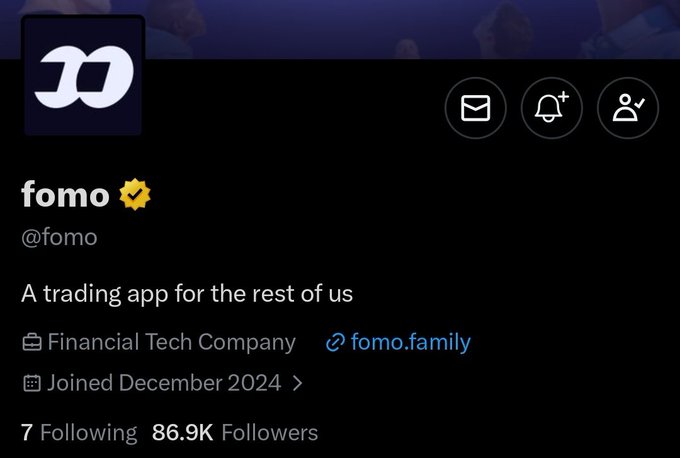 The image shows the Twitter/X profile of **@fomo**, a verified financial tech company with the tagline "A trading app for the rest of us," linking to fomo.family, joined in December 2024, with 86.9K followers. The profile supports the post's claim by showcasing FOMO's established presence as a social trading app in the crypto space.