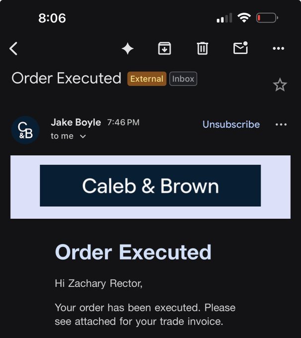 A screenshot of an email from Caleb & Brown titled "Order Executed" addressed to Zachary Rector, confirming a trade execution and referencing an attached trade invoice. This relates to a filled XLM buy order.
