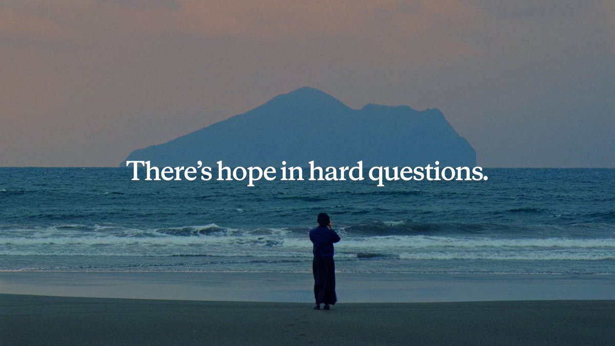 A lone figure stands on a beach at twilight, gazing out at a distant island, with the text "There's hope in hard questions." overlaid across the scene. The contemplative imagery pairs with the post's theme of endurance and the mention of "5.6 sol released" (a Mars rover measurement) by framing perseverance and difficult inquiry as a hopeful journey.