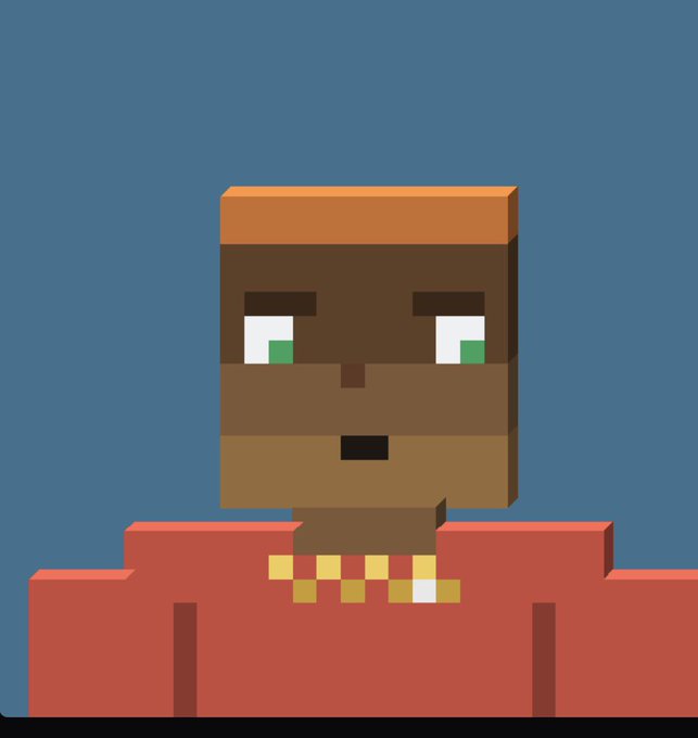 A blocky, pixel-art style character with a brown, stone-like face and green eyes wears a red garment and gold necklace against a blue background.