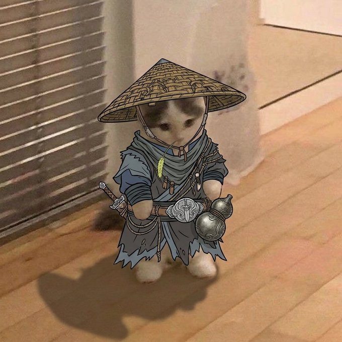 A small kitten stands on a wooden floor, digitally edited to wear a straw conical hat and elaborate blue samurai robes complete with swords and ornate gourd accessories.