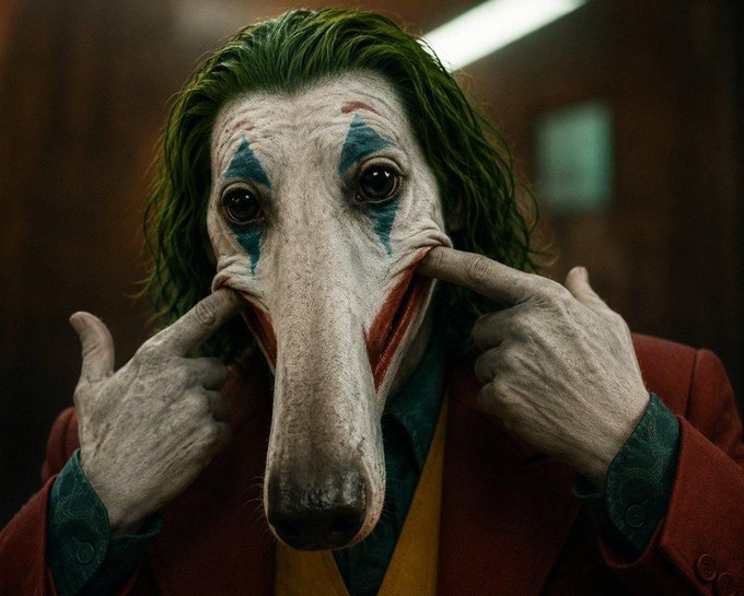 A figure with green hair and clown makeup smiles while pulling the corners of his mouth outward, his face exaggeratedly stretched into a long snout. The image humorously riffs on the iconic "Why so serious?" Joker line, replacing it with "Why so looong" to playfully emphasize his comically elongated facial features.