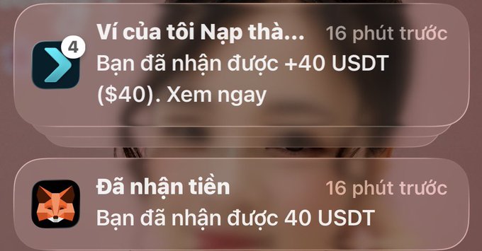 Vietnamese-language mobile notifications showing received USDT transactions: '+40 USDT ($40). Xem ngay' and '40 USDT', both marked '16 phút trước' (16 minutes ago).