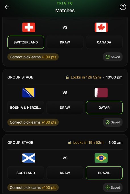 The image shows a screen of a phone displaying various soccer match scores, including group stage matches and draw matches between different countries. The focus of this particular image appears to be on Germany playing against Brazil. There are several options to choose from for bets on these games, as well as an app reminder that is linked to the post. It seems like Tria FC is the team being supported by someone in the image who has placed their bets and collected reward points.