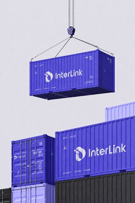Purple shipping containers branded with the 'InterLink' logo are shown stacked and suspended by a crane.