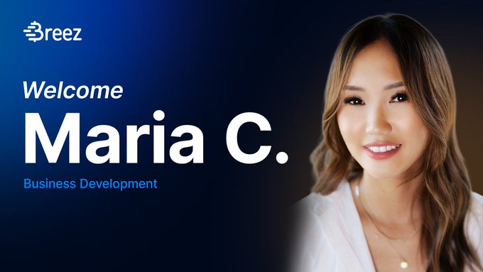 The image features a woman with brown hair wearing a white blouse smiling at the camera. The background of the image is dark blue, which contrasts with her light-colored outfit. Below her photo, there's text that reads "Welcome @maweaac She' s joined the Breez team to lead BD and help bring bitcoin to every app". This suggests that she might be a member or contributor to the Breez platform, where they are working on developing new ways for people to use Bitcoin.