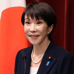 This image shows a Japanese official, likely involved in the announcement of Japan's $7 trillion bond market moving to blockchain technology, a plan involving the FSA, Finance Ministry, and Bank of Japan. The official's presence signifies the governmental backing and leadership behind this significant financial initiative.