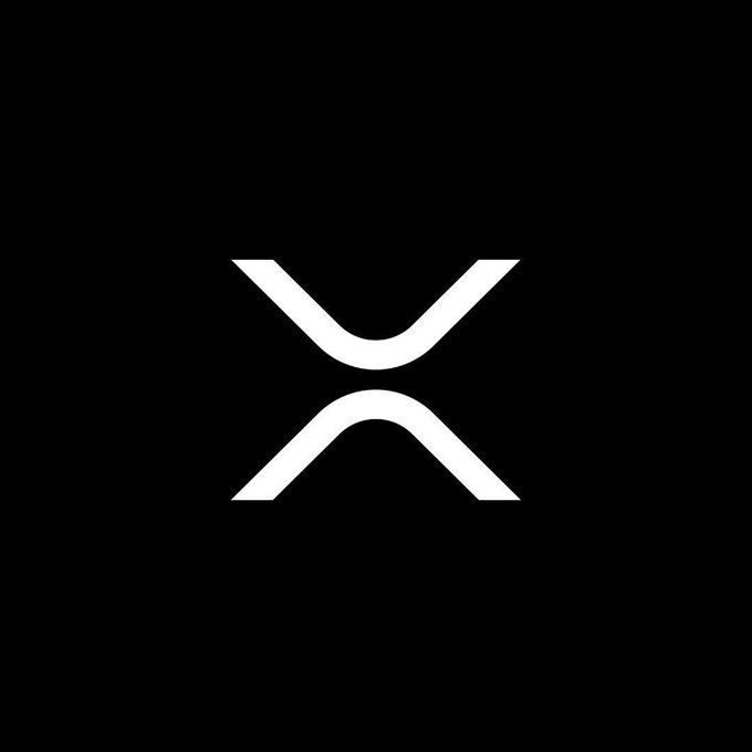 The image displays the white XRP logo—a stylized "X" formed by two curved chevrons—centered on a black background. This symbol directly represents the XRP cryptocurrency mentioned in the post, which was just added to Paxos's regulated crypto brokerage platform.