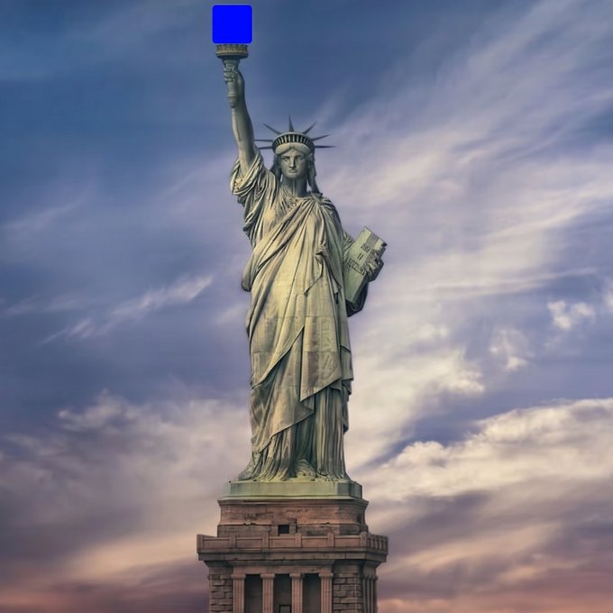 A digital artwork of the Statue of Liberty against a cloudy sky, but the torch has been replaced with a glowing blue square block.