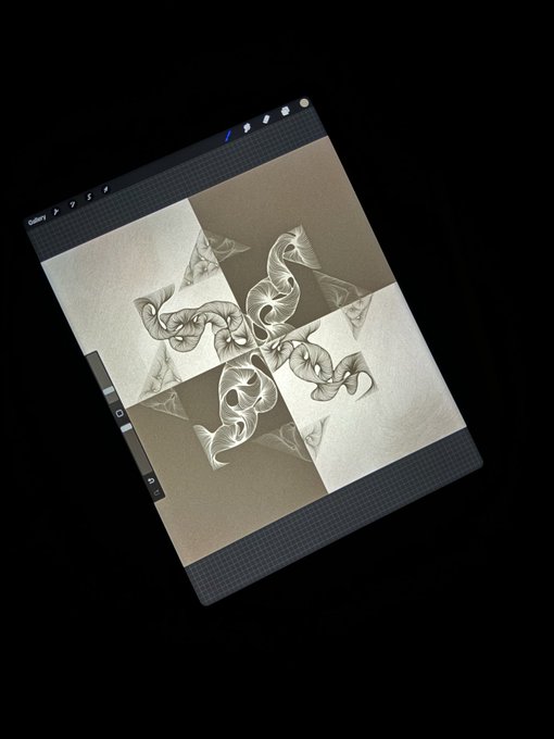 The image shows a tablet or computer screen displaying an abstract design, possibly a digital illustration of a geometric pattern with lines and shapes. The device appears to be turned off, as there are no visible lights or sounds associated with it. The focus is on the intricate patterns and designs displayed on the screen, which could be related to the post about "Gm Gm Happy Monday Interference 1/1".