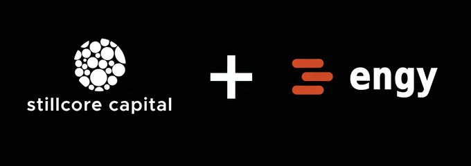 The image displays a graphic showing the combination of "stillcore capital" (with its bubble-style logo) and "engy" (with an orange equals-style icon) joined by a plus sign, set against a black background. This visual represents a business acquisition or merger partnership between the two companies.