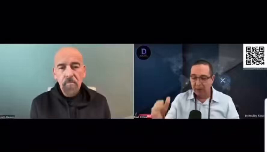 The image shows a video conference call between two men, both wearing glasses. They are sitting at a desk or table while talking to each other through their computer screens. The background of the image features a blue wall with a white border. There is also text in the image that reads "BULLISH: JOHN DEATON SAYS CLARITY ACT WILL BE HUGE FOR $XRP, $ETH & BITCOIN! I think it's good news for 
bitcoin & others." The post seems to be discussing the potential impact of a new law on cryptocurrency and its users.