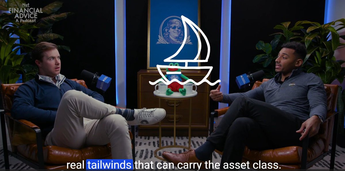 A screenshot from the "Not Financial Advice" podcast shows two hosts seated in leather chairs discussing crypto, with a Captain Crunch graphic overlay and a stuffed frog on a table between them. The subtitle reads "real tailwinds that can carry the asset class," directly addressing the post's question about whether the current crypto cycle feels different.
