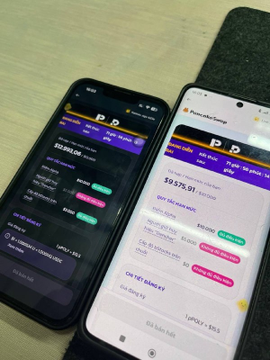 Two smartphones displayed side-by-side on a desk, showing cryptocurrency portfolio apps with balance figures including '9376.01', '5326.06', and '6895.03'.