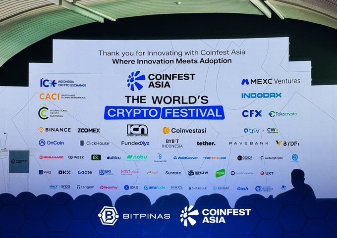 A large presentation screen at an event reading 'Thank you for Innovating with Coinfest Asia' and 'THE WORLD'S CRYPTO FESTIVAL', displaying numerous sponsor logos including Binance, Indodax, CFX, and Tokocrypto, with 'BITPINAS' and 'COINFEST ASIA' watermarks.