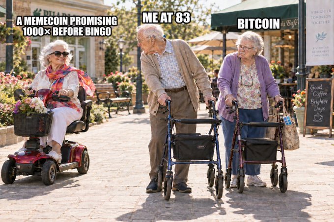 A meme image showing elderly people at what appears to be a senior living community, with labels 'A MEMECOIN PROMISING 1000× BEFORE BINGO' on a woman in a mobility scooter, 'ME AT 83' on a man with a walker, and 'BITCOIN' on a woman in a walker, humorously suggesting both the man and Bitcoin are slow/aged.