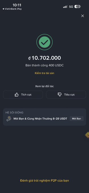 A Vietnamese Binance P2P transaction confirmation screen showing a successful sale of 400 USDC for 10,702,000 VND, fitting the post's theme of cashing out cryptocurrency. The post encourages others to cash out their crypto and asks if they've done the same, directly relating to this completed withdrawal transaction.