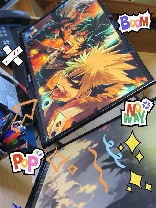 A framed anime poster featuring characters from My Hero Academia (Deku and Bakugo) in an action scene, placed on a desk and decorated with various colorful pop-art style stickers like 'BOOM', 'NO WAY', and 'POP'.