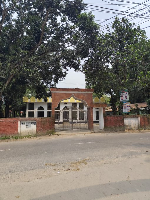 The image shows an old brick building with a white archway, surrounded by trees. The building has a gate that is open, allowing for visibility into its interior. A sign can be seen near the entrance of the building, which reads "Good morning X legend! Don'T search for peace in a coffee cup find it within your heart." This message seems to be related to the post about finding inner peace and tranquility. The image also contains some text that says "Nomisma Network super @useTria and @quipnetwork 3look".