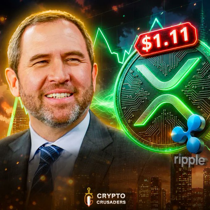A promotional crypto graphic featuring Brad Garlinghouse smiling alongside a glowing XRP coin, a price tag of $1.11, the Ripple logo, and 'CRYPTO CRUSADERS' branding.