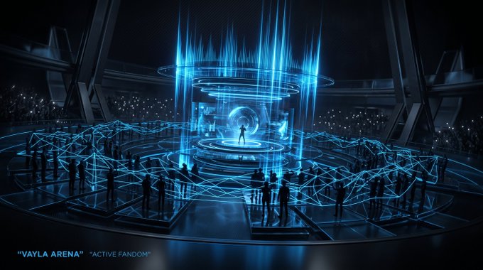 The image depicts a futuristic, glowing blue digital arena with a silhouetted figure standing at its center on a circular platform, surrounded by crowds of people connected by luminous web-like patterns, with text reading "VAYLA ARENA" and "ACTIVE FANDOM" in the bottom left corner.

The visual reinforces the post's theme by illustrating VAYLA Arena as an interactive, network-driven space where fans converge around a central performer, symbolizing a shift from passive streaming to active, interconnected participation in the music ecosystem.