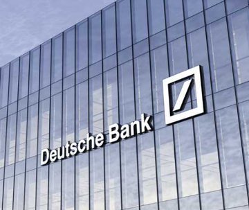 The exterior facade of a modern glass building displaying the 'Deutsche Bank' logo and name.