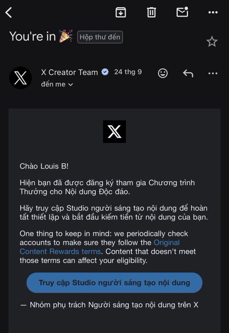 The image shows an email in Vietnamese from "X Creator Team" (verified account) dated the 24th, confirming that Louis B has successfully registered for the Creator Revenue Sharing Program and prompting them to access Creator Studio to complete setup and start monetizing content. This relates to the post's caption about wishing luck to others who haven't received this type of creator monetization notification yet.