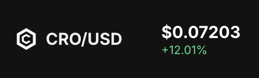 A cryptocurrency price ticker displaying CRO/USD at $0.07203, showing a +12.01% increase.