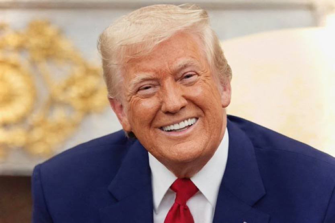 In this image, former President Donald Trump smiles and discusses his interest in cryptocurrency, stating, "I've become a big crypto guy... I'm a fan."