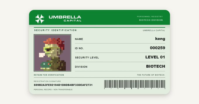A green "UMBRELLA CAPITAL" security ID card for employee "keng" (ID 000259) in the Biotech division, featuring a pixelated zombie character and a barcode.