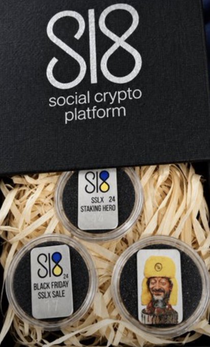 A black box labeled "S18 social crypto platform" contains three silver commemorative coins featuring "SSLX '24 STAKING HERO", "BLACK FRIDAY SSLX SALE", and a character design.