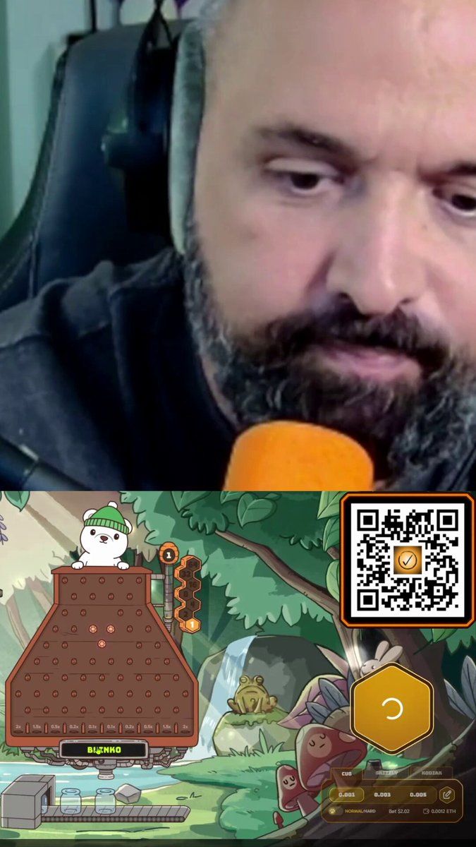 The image features an advertisement for a game called "blinko" that includes a man with a beard eating an orange slice while wearing headphones. The ad also contains a QR code, which could be used to access additional information about the game or even enter a special prize.