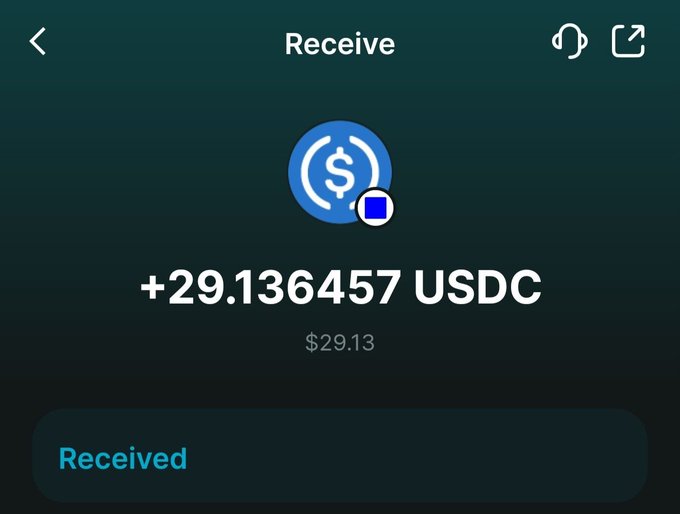 A cryptocurrency wallet screen showing a successful receive of +29.136457 USDC ($29.13).
