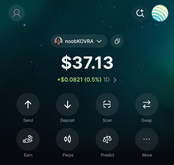 A cryptocurrency wallet app screen displays a balance of $37.13 with a 1D gain of +$0.0821 (0.5%) under the username "noobKOVRA," featuring action buttons for Send, Deposit, Scan, Swap, Earn, Perps, Predict, and More. The image illustrates the poster's small starting capital in their crypto journey, aligning with their post about beginning with 0.5 SOL and hoping to grow from a modest base into larger gains.