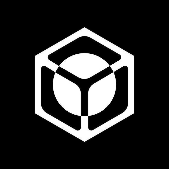A white geometric logo on a black background featuring a hexagonal outline with a central circle and three inward-pointing triangular shapes.