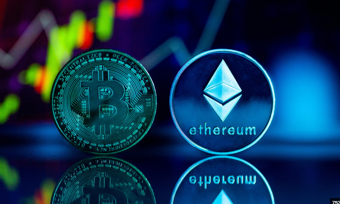 A Bitcoin coin and an Ethereum coin sit side by side on a reflective surface, with a candlestick trading chart illuminated in red and green behind them, visually representing the surge in spot ETF trading volume mentioned in the post.