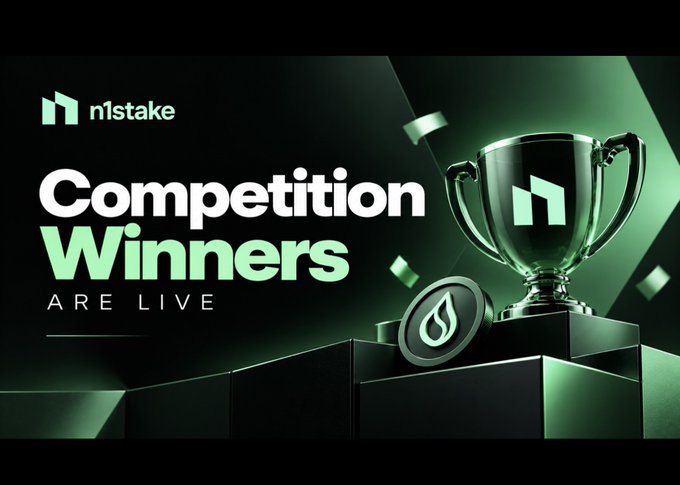 A promotional graphic for n1stake featuring a green trophy on a podium with confetti, announcing that 'Competition Winners Are Live'.