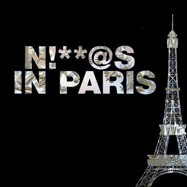 A black background image featuring a cutout silhouette of the Eiffel Tower on the right and bold textured text reading 'N!***@S IN PARIS' (an obscured profanity phrase).