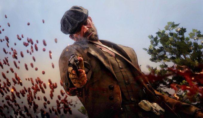 A dramatic, low-angle screenshot from Red Dead Redemption 2 shows a bearded man in a flat cap and worn coat pointing a revolver at the camera, with blood splatter effects visible against a bright sky and green trees in the background.