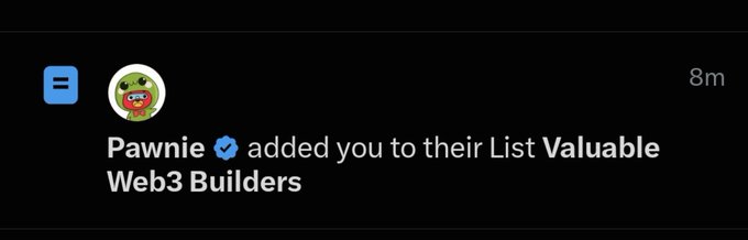 A Twitter/X notification showing 'Pawnie added you to their List Valuable Web3 Builders' with the Pawnie verified account avatar.