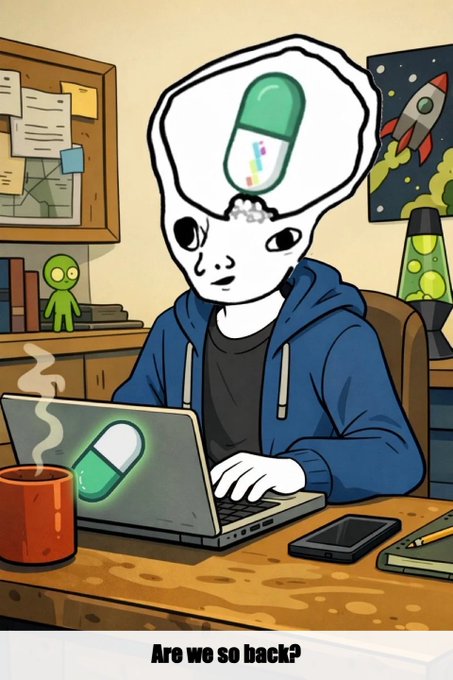 A digital drawing of a pale character with a large cranium topped by a green and white pill capsule, sitting at a desk with a laptop displaying a pill logo, captioned "Are we so back?"
