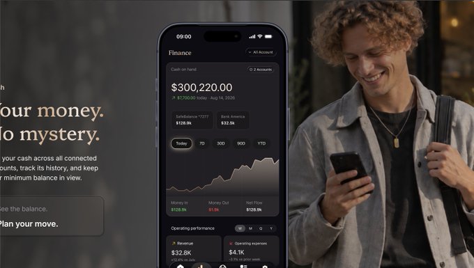 A promotional image showing a man smiling while looking at a finance tracking app displayed on a smartphone, featuring a cash balance of $300,220.00 and account metrics.