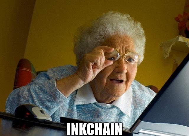 A meme of an elderly woman peering over her glasses at a laptop with the caption 'INKCHAIN'.