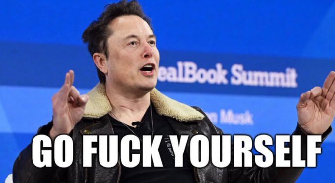 Elon Musk speaks on stage at the Real Book Summit, wearing a black leather jacket with a shearling collar and gesturing with both hands. Large bold white text across the bottom reads “GO FUCK YOURSELF,” matching the post’s description of his refusal to delete a tweet about $pump.
