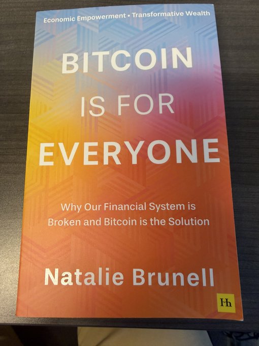 A book titled 'BITCOIN IS FOR EVERYONE: Why Our Financial System is Broken and Bitcoin is the Solution' by Natalie Brunell, with the tagline 'Economic Empowerment + Transformative Wealth'.