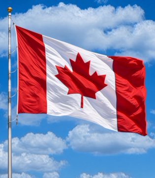 The Canadian flag waves against a blue sky, symbolizing the country behind a new initiative in which Canada's six largest banks have joined forces to launch a joint tokenized Canadian-dollar deposit project aimed at making interbank payments faster and more programmable.