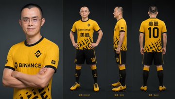 The image features a man wearing a yellow and black soccer uniform, standing against a black background with his arms crossed. The photo captures him from three different angles, showcasing various aspects of his appearance and stance. In addition to the main subject, there is also an element related to the World Cup in the form of a post on social media that includes a prediction market for predicting the outcome of the event. This adds a unique twist to the image by incorporating elements of both sports and technology.