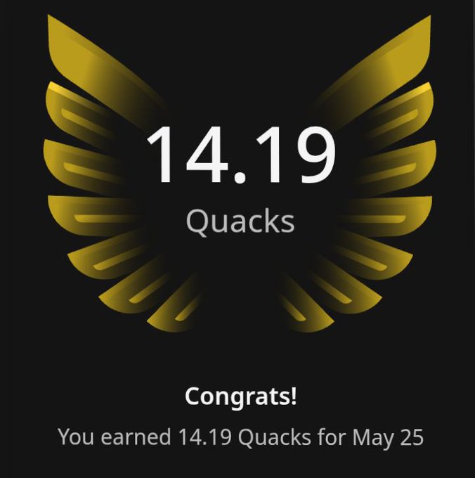 The image features a gold-colored bird's wing with the text "14.19 Quacks" written below it, which indicates that 14.19 Quacks have been earned by the user. The background of the image is black, making the gold wing stand out prominently.