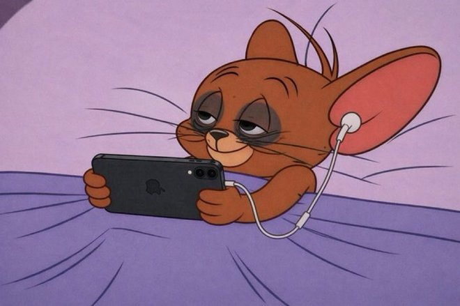 Jerry from Tom and Jerry lies on a purple bed with half-closed eyes, holding an iPhone with white earbuds plugged in.